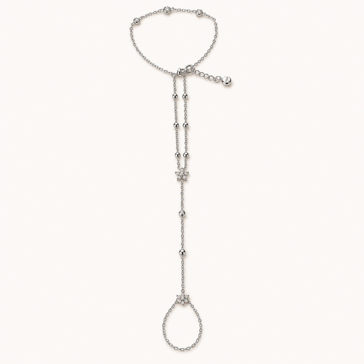 Chaîne de main Mila argentée, chaîne à perles avec fleur sertie de strass et boucle en cœur