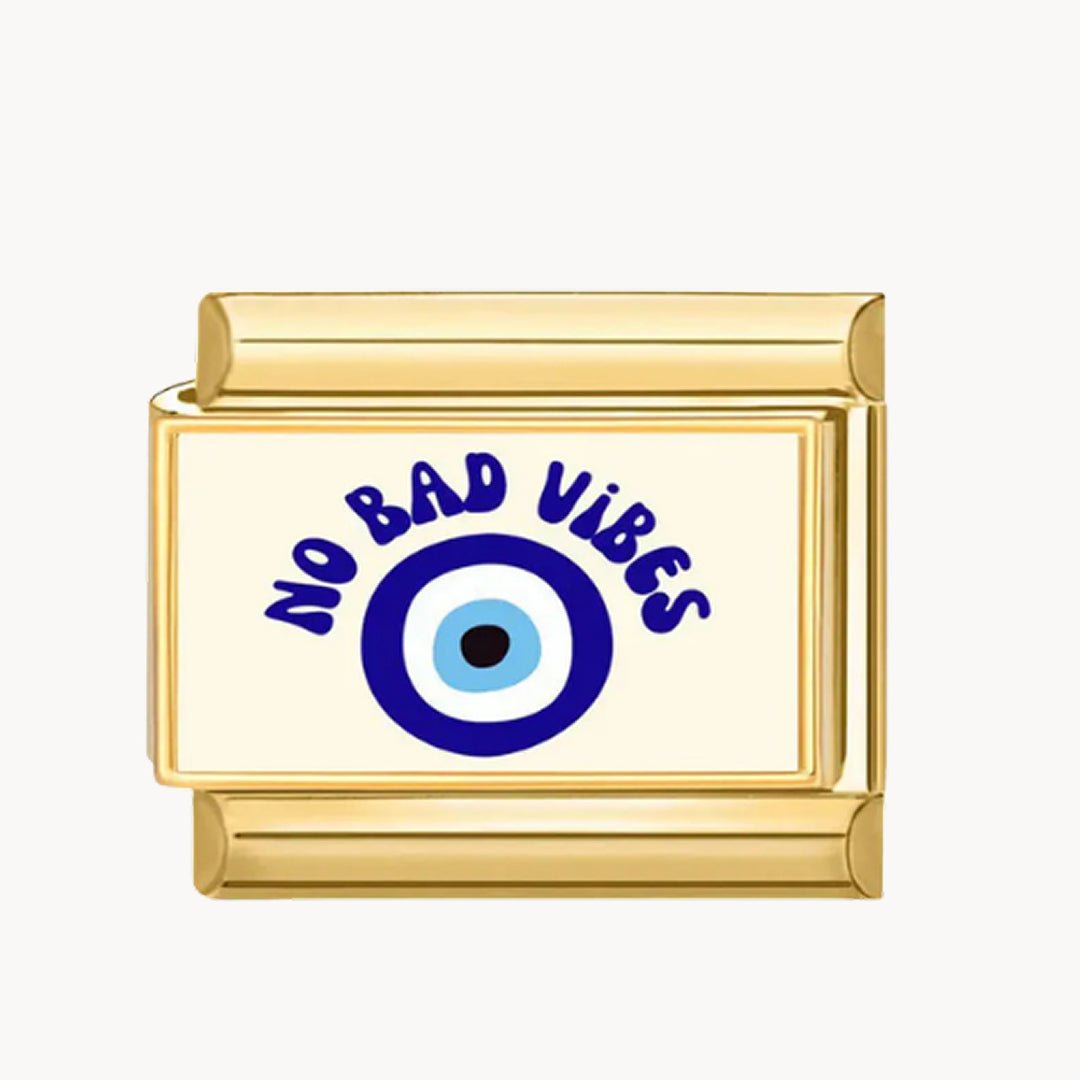 Charm italien Charm no bad vibes : « NO BAD VIBES » bleu marine et un œil bleu, fond crème